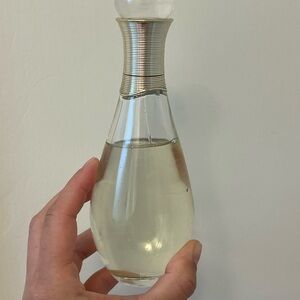 Dior J'adore Perfume Bottle with Gold Hue